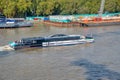 An Uber Thames Clipper ferry boat on the river Thames