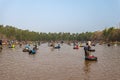 Ubon Ratchathani, Thailand - March 20, 2020 : Many Thai people casting a net for catching fish at river. Fishermen show ancient