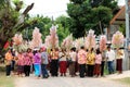 Ubonratchasima,THAILAND -March 13, 2014:offering robes to Buddhist priests at monastery. Royalty Free Stock Photo