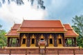 Ubosot ordination hall made from teakwood in Tesdhammanava temple