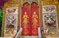 The facade wall and door of the Ubosot of Wat Ket Karam, Chiang Mai, Thailand