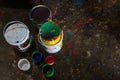 UBUD/BALI-APRIL 27 2019: colorful paint bucket with a brush and the floor is filled with beautiful solid color because the paint