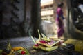 Ceremonial daily offering selective focus on foreground. Ubud. Bali. Indonesia