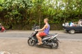 Caucasian tourist on motorbike