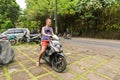 Caucasian tourist on motorbike