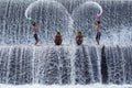 Poverty boys having fun at Tukat Unda dam, Bali