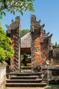 Split gate separating two mandalas at Batuan temple, Ubud, Bali Indonesia