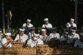 UBUD,BALI-MAY 11 2021: A group of Balinese youths playing the Balinese Gambelan musical instrument to accompany a ceremony during