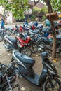 UBUD, INDONESIA - AUGUST 29, 2008: Parking with a lot of motorbi Royalty Free Stock Photo