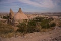 Uchisar, Cappadocia, Turkey: The road leads to the city and Uchisar castle. Rock houses and churches Royalty Free Stock Photo