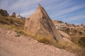 Uchisar, Cappadocia, Turkey: The road leads to the city and Uchisar fortress. Rock houses and churches Royalty Free Stock Photo