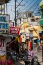 Udaipur, India - August 20, 2009: main street full of people and shops in Udaipur, India