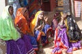 Indian Rajasthani gypsy women in traditional clothes selling beads at local market, Rajasthan state, India