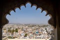 Aerial view of the Udaipur Cityscape in the state of Rajasthan. Framed by an archway of City