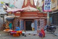 A family in front of a small store of the traditional market in Udaipur