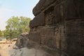 Passageway leading to Udayagiri Caves & wall niche on the right with carving of Narasimha, lion avatar of Hindu god Vishnu, India
