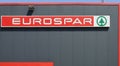 Eurospar sign with brand name and logo on the store facade.