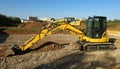 Komatsu excavators at work in a new development urban residential area .