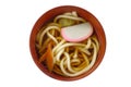 Udon japanese noodle with fresh Kamaboko or Japanese fish ball, isolated in white background Royalty Free Stock Photo