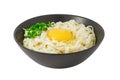 Udon noodles with raw egg and herbs in a gray bowl, isolated on white background with clipping path Royalty Free Stock Photo