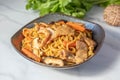 Udon stir fry noodles teriyaki sauce with pork meat and vegetables shiitake mushrooms Royalty Free Stock Photo