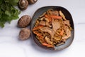 Udon stir fry noodles teriyaki sauce with pork meat and vegetables shiitake mushrooms Royalty Free Stock Photo