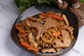 Udon stir fry noodles teriyaki sauce with pork meat and vegetables shiitake mushrooms Royalty Free Stock Photo