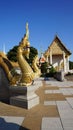 Beautiful Naka sculpture decoration at the staircase of Buddist stupa calls Phrathammachedi in Wat Pothisomphon the landmark of