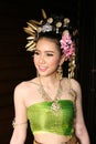 One woman in THAI RETRO DRESS is posing for a photograph.