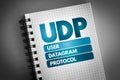 UDP - User Datagram Protocol acronym on notepad, technology concept background