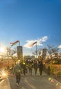 People walking on the Tenryu stone bridge of the Kaneiji Temple in the Ueno park at sunset, Tokyo,