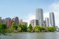 Ueno Park Shinobazu Pond and skyscraper at spring in Tokyo, Japan