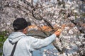 Birds in human hand in the park