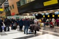 Ufa, Russia april 2, 2020: Passengers arrive at check-in counters at UFA Airport in Russia. Crowds of travelers in queue at