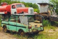 Ufa Russia 1 July 2019: vintage cars abandoned and rusting away in rural wyoming.