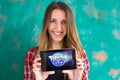 Ufa, Russia. - July 29: Woman show the tablet with Pokemon Go logo