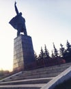 UFA, RUSSIA - 1 june 2016: silhouette Sculpture of Vladimir Ilyich Lenin in the town square against the sky and stairs. Concept