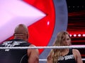 UFC star and Bantamweight Champion Ronda Rousey and the Rock, Dwayne Johnson, in the ring during Wrestlemania 31