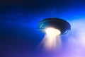 UFO with abduction beam flying in the sky Royalty Free Stock Photo