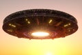 UFO, an alien plate soars in the sky, hovering motionless in the air. Unidentified flying object, alien invasion, extraterrestrial Royalty Free Stock Photo