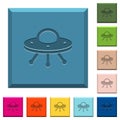 UFO engraved icons on edged square buttons
