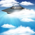 UFO flying in blue sky Royalty Free Stock Photo