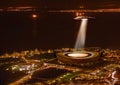UFO, lights and city in night, buildings and alien invasion for search, stadium or Cape Town. UAP spaceship, flying