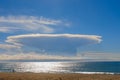 The UFO-shaped cloud above the sea
