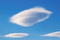 UFO shaped cloud - Lenticularis lentil-shaped coud on the blue sky Royalty Free Stock Photo