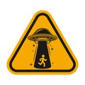 Ufo stealing human vector yellow road sign illustration concept Royalty Free Stock Photo