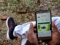 ufx trader app for Android user displayed at smart phone screen in india dec 2019