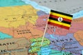 Uganda flag on a map Royalty Free Stock Photo