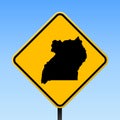 Uganda map on road sign.