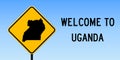 Uganda map on road sign.